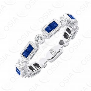 18k KARAT DIAMOND AND GEMSTONE RING