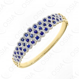18 KARAT DIAMOND AND GEMSTONE BANGLE